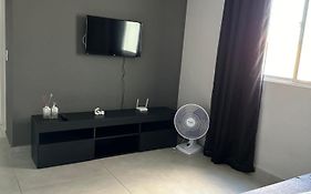 Apartamento novo ao lado do Rio Centro!